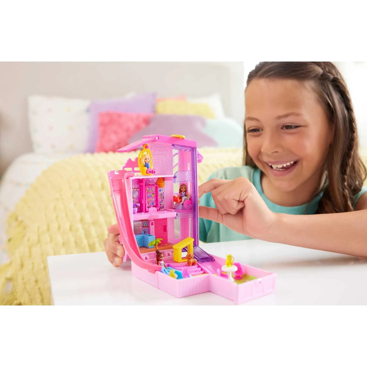 Polly Pocket Barbie Dreamhouse Compact, Dollhouse Playset with 3 Micro Dolls, 1 Pet & 11 Accessories