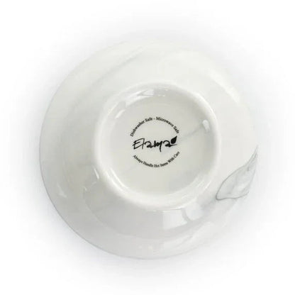 Elama Fine Marble 16 Piece Stoneware Dinnerware Set in Black and White