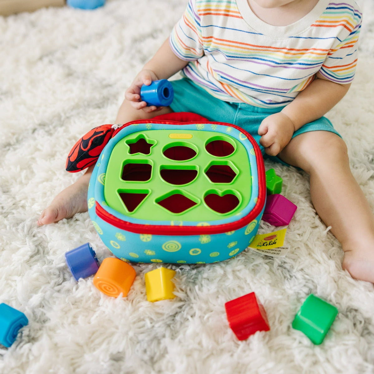 Melissa & Doug K's Kids Take-Along Shape Sorter Baby Toy With 2-Sided Activity Bag and 9 Textured Shape Blocks