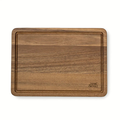 Thyme & Table Medium 10"x14" Acacia Wood Cutting Board with Triangle Shaped Anti-Slip Grips